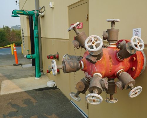 fire hose unit mounted on a building